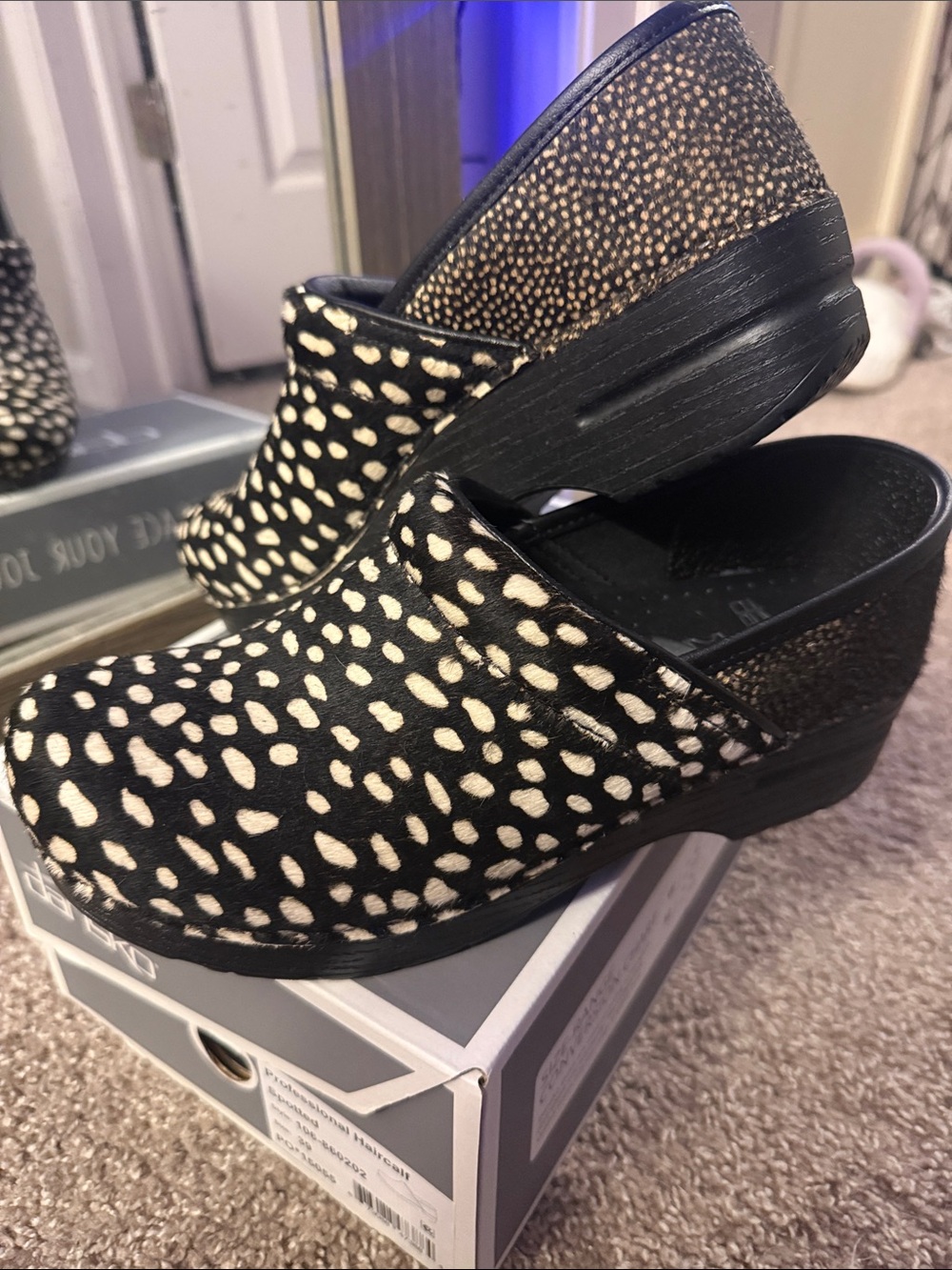 Dansko Black & White Spotted Haircalf Clog - Picture 3 of 10